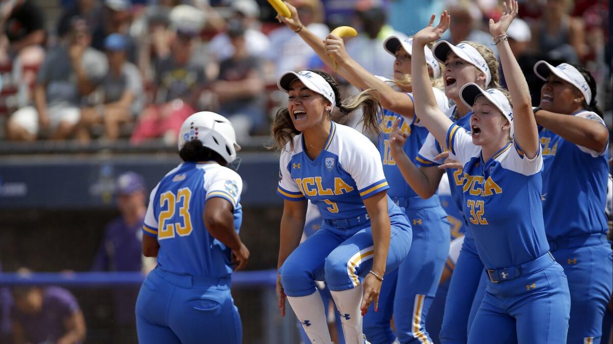 UCLA celebrates Rachel Garcia's walk-off home run against Washington on June 2.