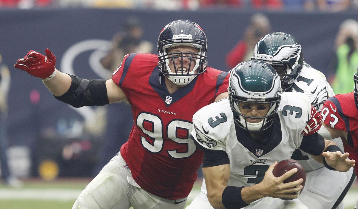 Houston's J.J. Watt looks to take down Philadelphia quarterback Mark Sanchez back in November.