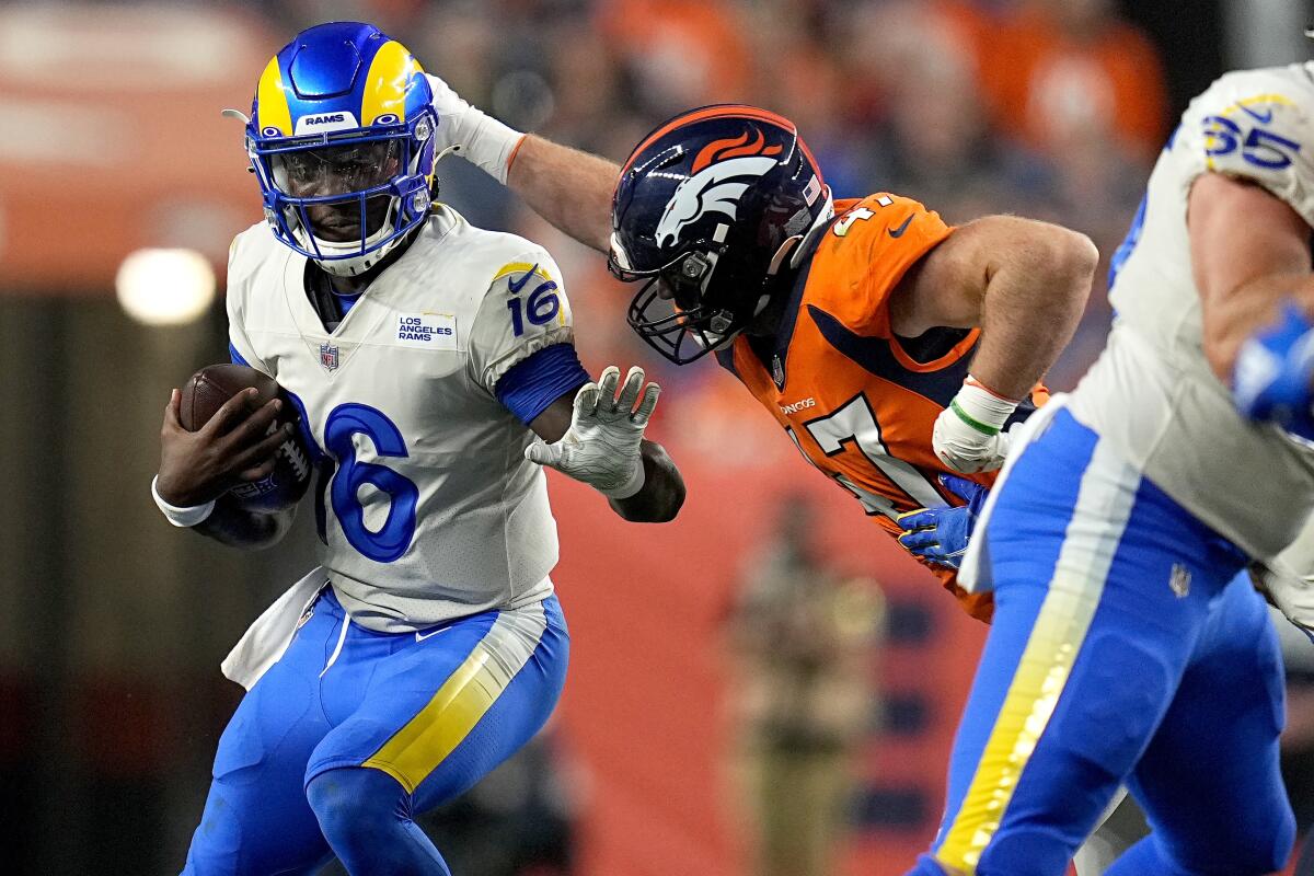 The Los Angeles Rams and Denver Broncos play an NFL preseason game in Denver on Aug. 28. 