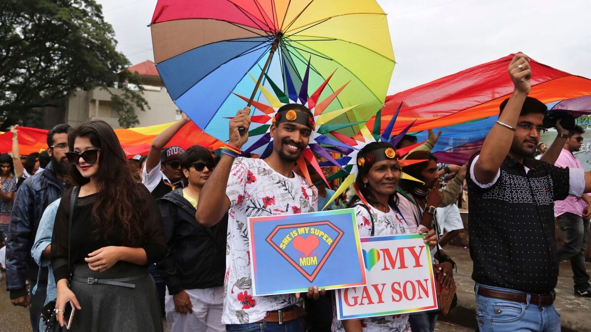 Members and supporters of the LGBTQ community participate in a Pride March in Bangalore, India. (Aijaz Rahi / Associated Press)