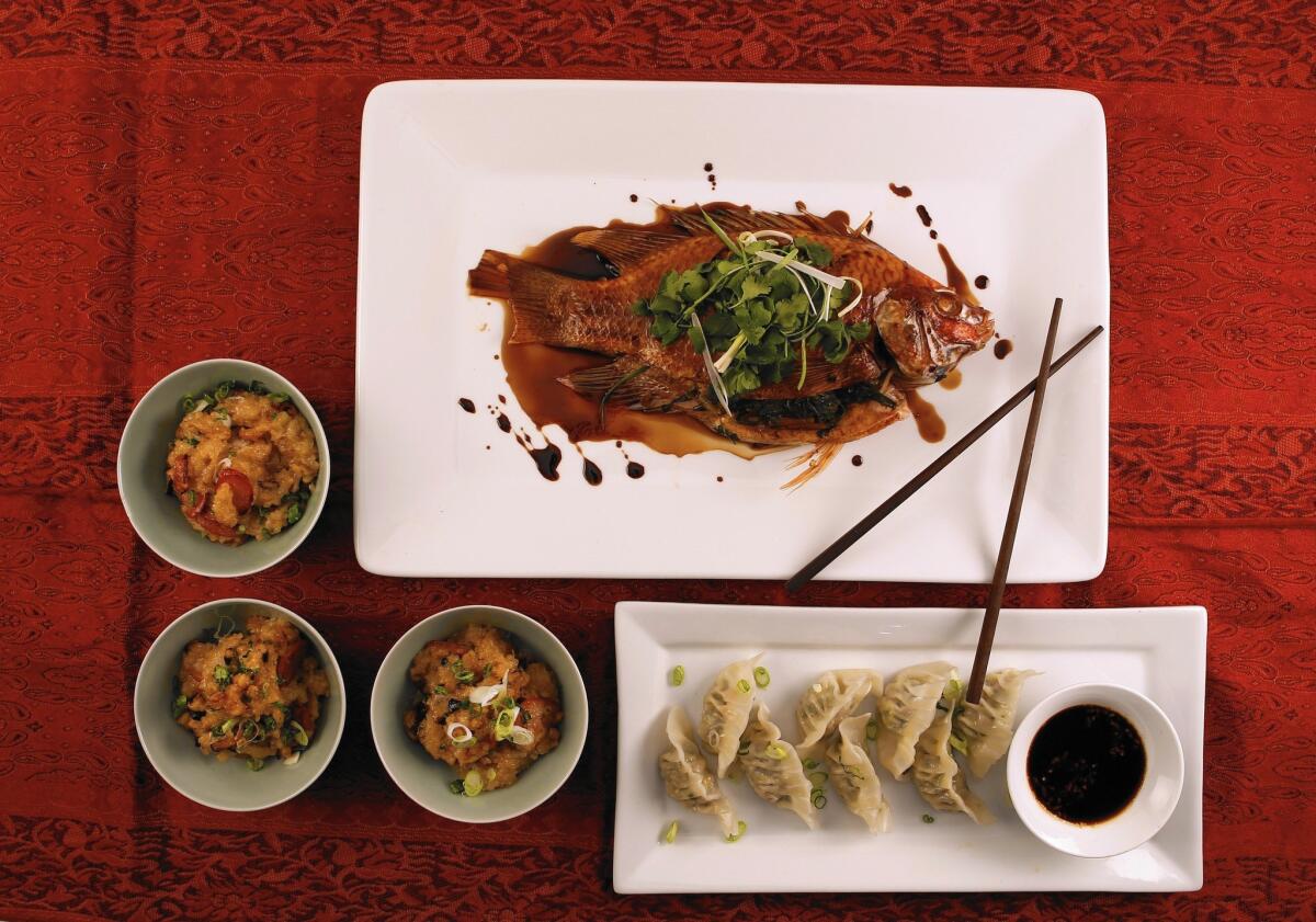 A Chinese New Year meal can include whole fish, dumplings and sticky rice.