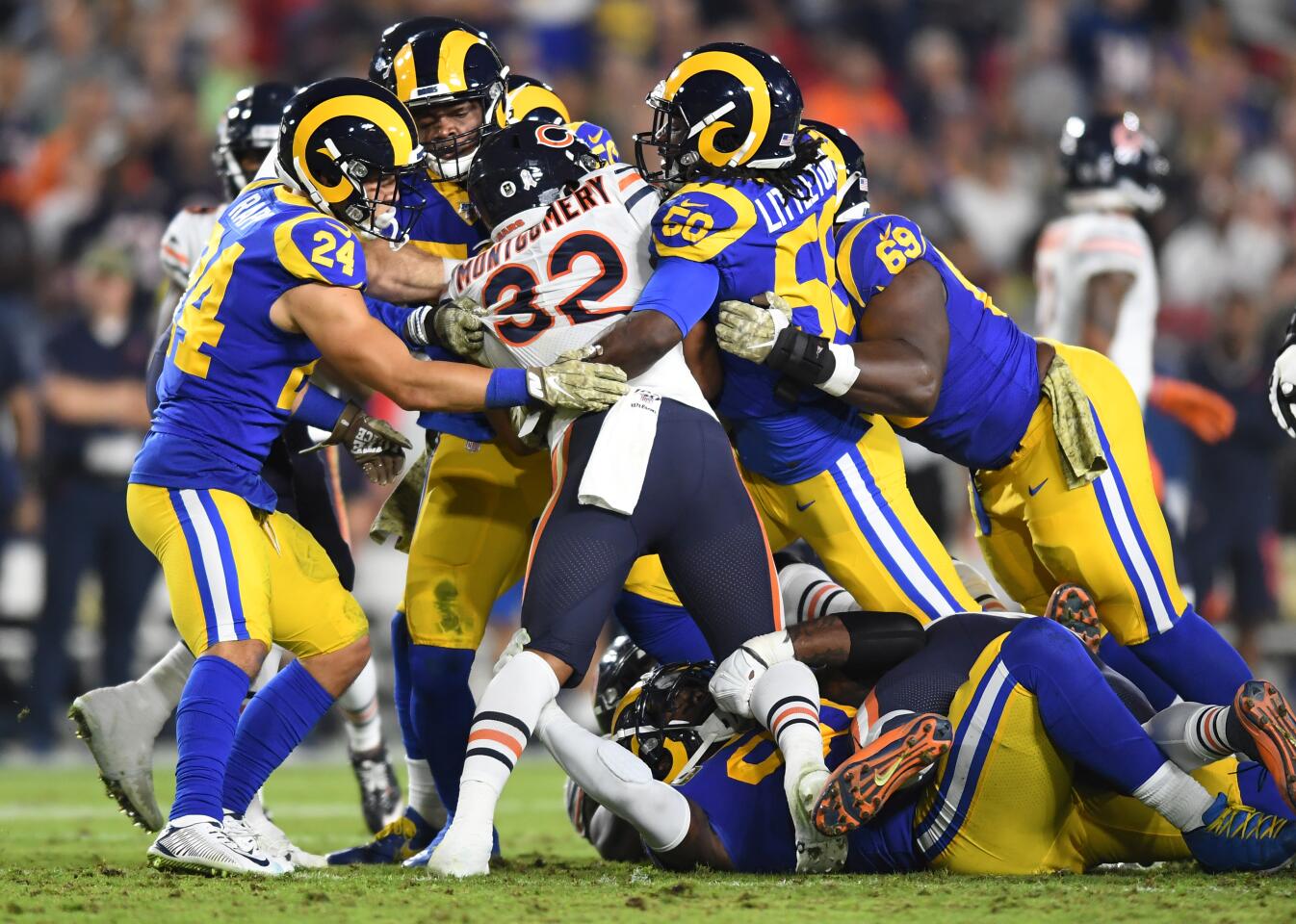 Bears running back David Montgomery is stopped by the Rams' defense.
