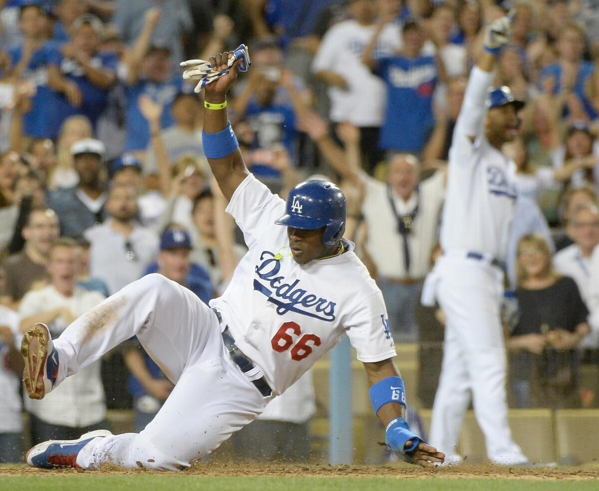 Yasiel Puig went two for three with a run batted in, a double, a run and a walk in the Dodgers' 7-1 win over the Marlins on a night fans received his bobblehead.