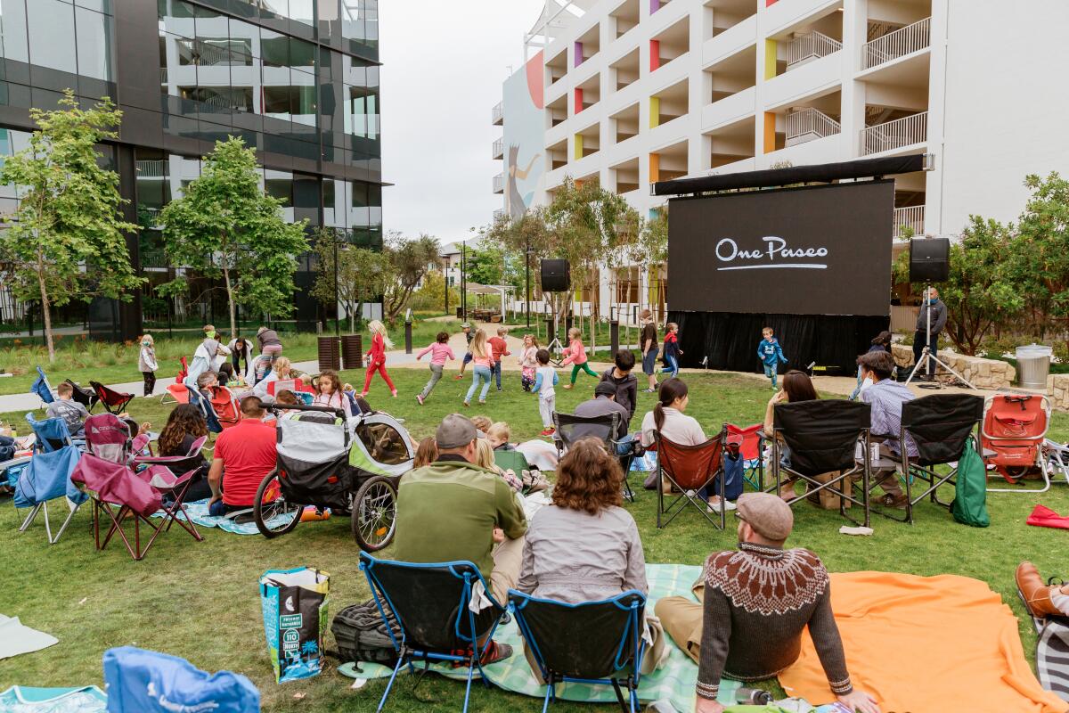 Guests enjoy last year's Moonlight Cinema at One Paseo.