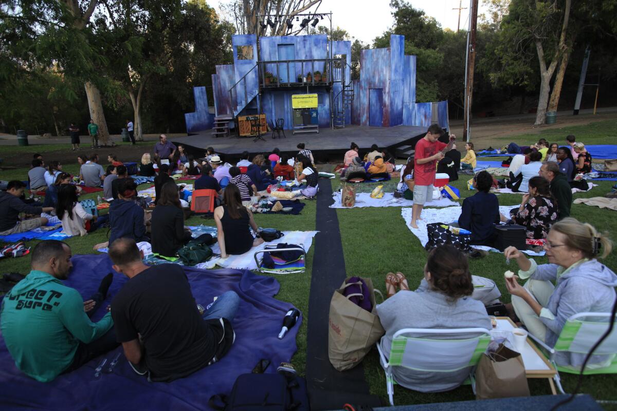 The audience arrives early for the Independent Shakespeare Co. production of "The Taming of the Shrew" at the Old Zoo in Griffith Park in Los Angeles on Aug. 8, 2014.