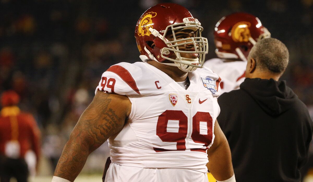 Former USC defensive tackle Antwaun Woods gets ready for the Holiday Bowl against Wisconsin on Dec. 30, 2015.