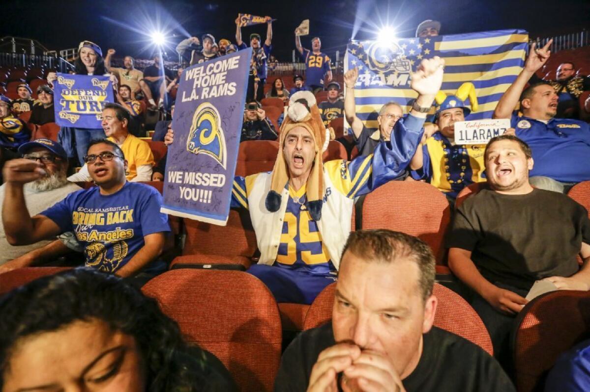 Rams fans cheer during the team's reintroduction to Los Angeles at a news conference on Jan. 15.
