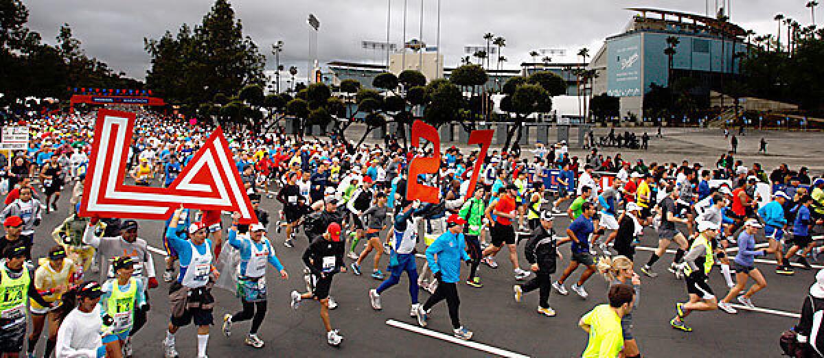 Runners begin the L.A. Marathon at Dodger Stadium.