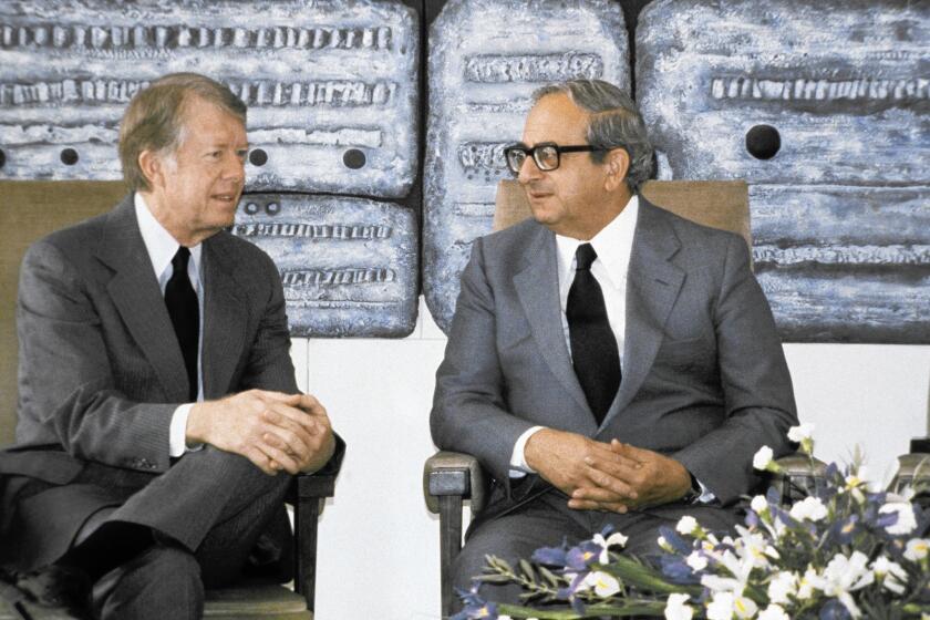 Israel's fifth president, Yitzhak Navon, right, with U.S. President Carter in 1979. Though Israel’s presidency is largely a ceremonial post, Navon was seen as a politician capable of bringing diverse people together.