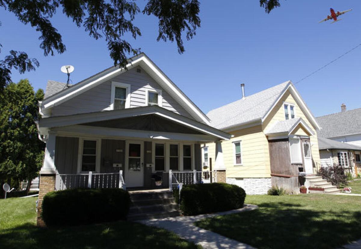 The Cudahy, Wis., duplex where the suspected shooter in the Sikh temple shooting, Wade Michael Page, lived. Page, a discharged Army veteran and with alleged links to white power groups, allegedly opened fire and killed six people Sunday at a Sikh temple in Oak Creek.