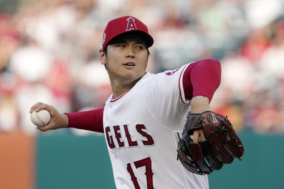 The Angels' Shohei Ohtani pitches against the Colorado Rockies on July 26, 2021.