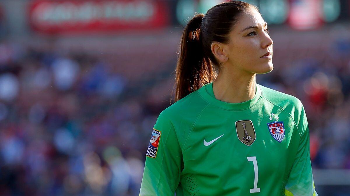 Hope Solo walks off the field at halftime of a CONCACAF Olympic qualifying tournament soccer match in Frisco, Texas, in 2016.