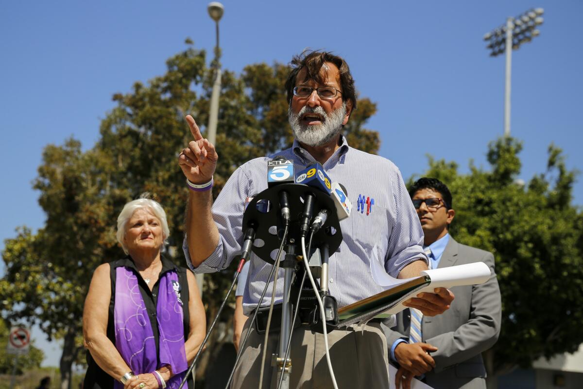 Richard Martinez, father of Isla Vista shooting victim Christopher Ross Michaels-Martinez, speaks along with survivors of mass shootings and family members of mass-shooting victims during a July 30 news conference in Santa Monica.