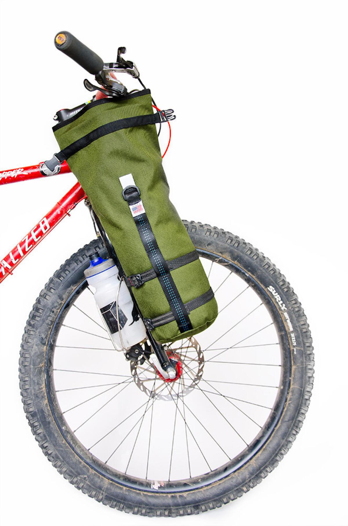 The Road Runner Body Bag is a handy fork-mounted waterproof dry-sack pannier.