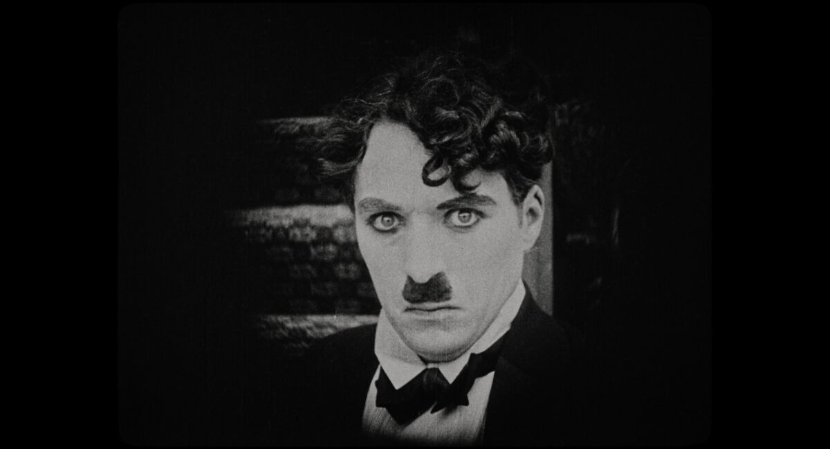 A man with a toothbrush mustache, from the documentary "The Real Charlie Chaplin."
