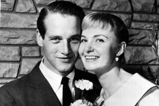 Joanne Woodward and actor Paul Newman in 1958.