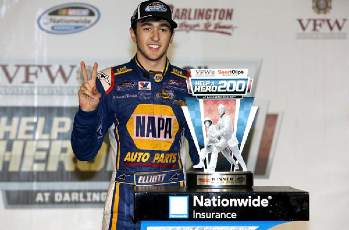 NASCAR driver Chase Elliott celebrates in Victory Lane after winning the Nationwide Series race on Friday night in Darlington, S.C.