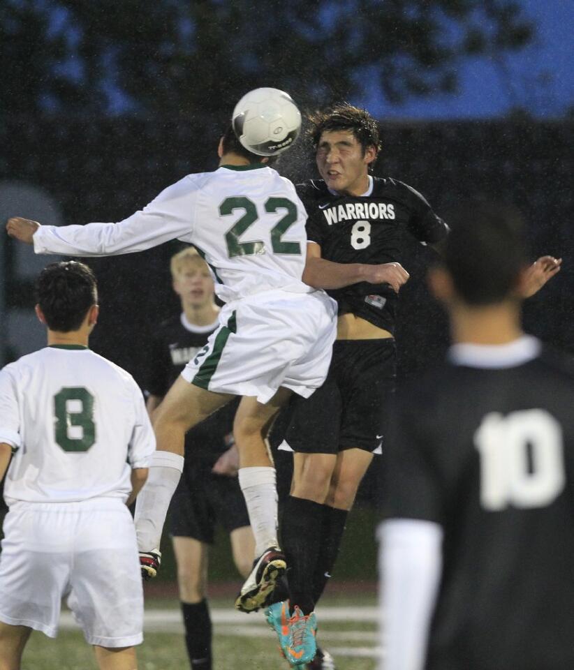 Brethren Christian's David Han, top right, battles for a header during the first half against Sage Hill in an Academy League game on Thursday.