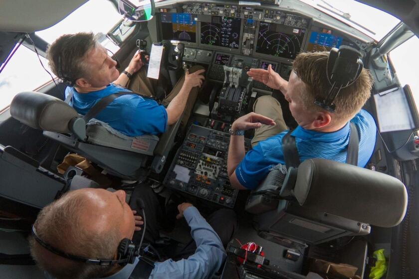 In this April 3, 2019, image courtesy of Boeing, Dennis Muilenburg (lower L), CEO of Boeing, joins Boeing test pilot for a flight demo of updated MCAS software on a 737 MAX 7. - According to a statement from Boeing, the flight crew performed different scenarios that exercised various aspects of the software changes to test failure conditions. The software update worked as designed, and the pilots landed safely at Boeing Field. (Photo by PAUL WEATHERMAN / BOEING / AFP) / RESTRICTED TO EDITORIAL USE - MANDATORY CREDIT "AFP PHOTO / Boeing / PAUL WEATHERMAN" - NO MARKETING NO ADVERTISING CAMPAIGNS - DISTRIBUTED AS A SERVICE TO CLIENTSPAUL WEATHERMAN/AFP/Getty Images ** OUTS - ELSENT, FPG, CM - OUTS * NM, PH, VA if sourced by CT, LA or MoD **