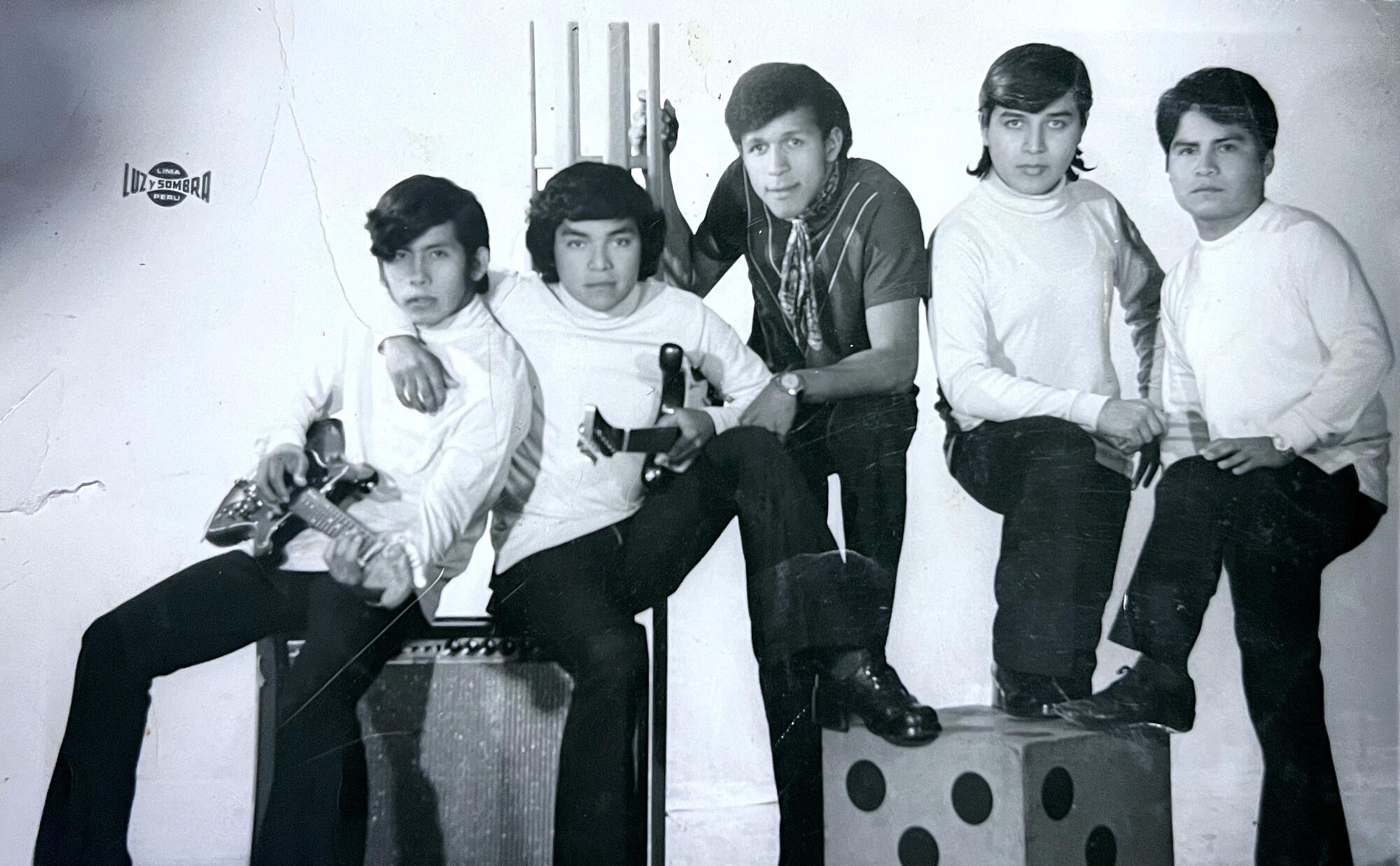 Black and white photo of five men