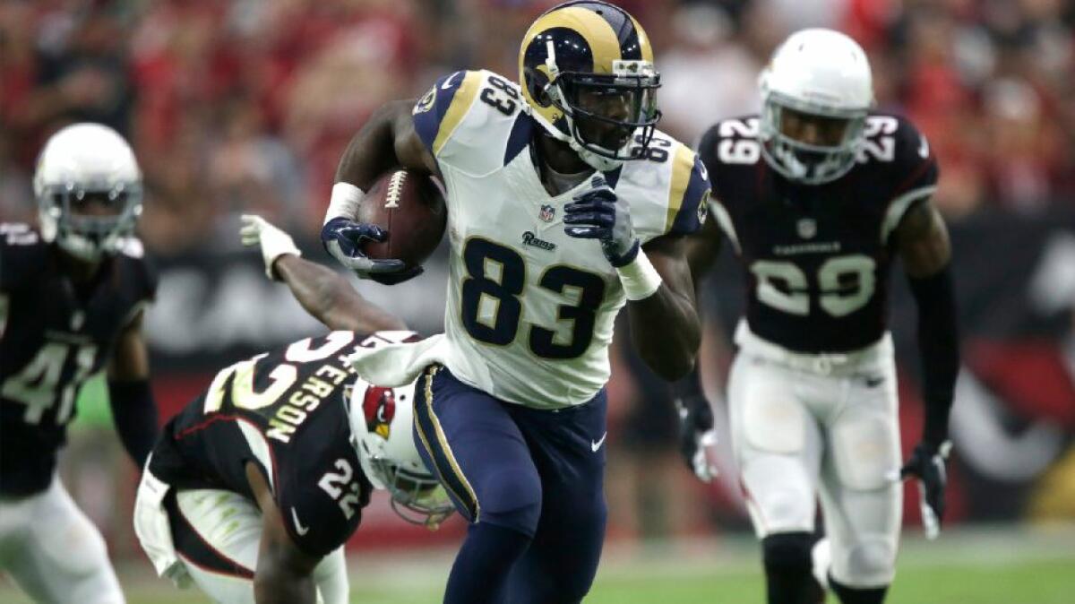 Rams receiver Brian Quick scores on a 65-yard catch-and-run against the Arizona Cardinals at University of Phoenix Stadium on Oct. 2.