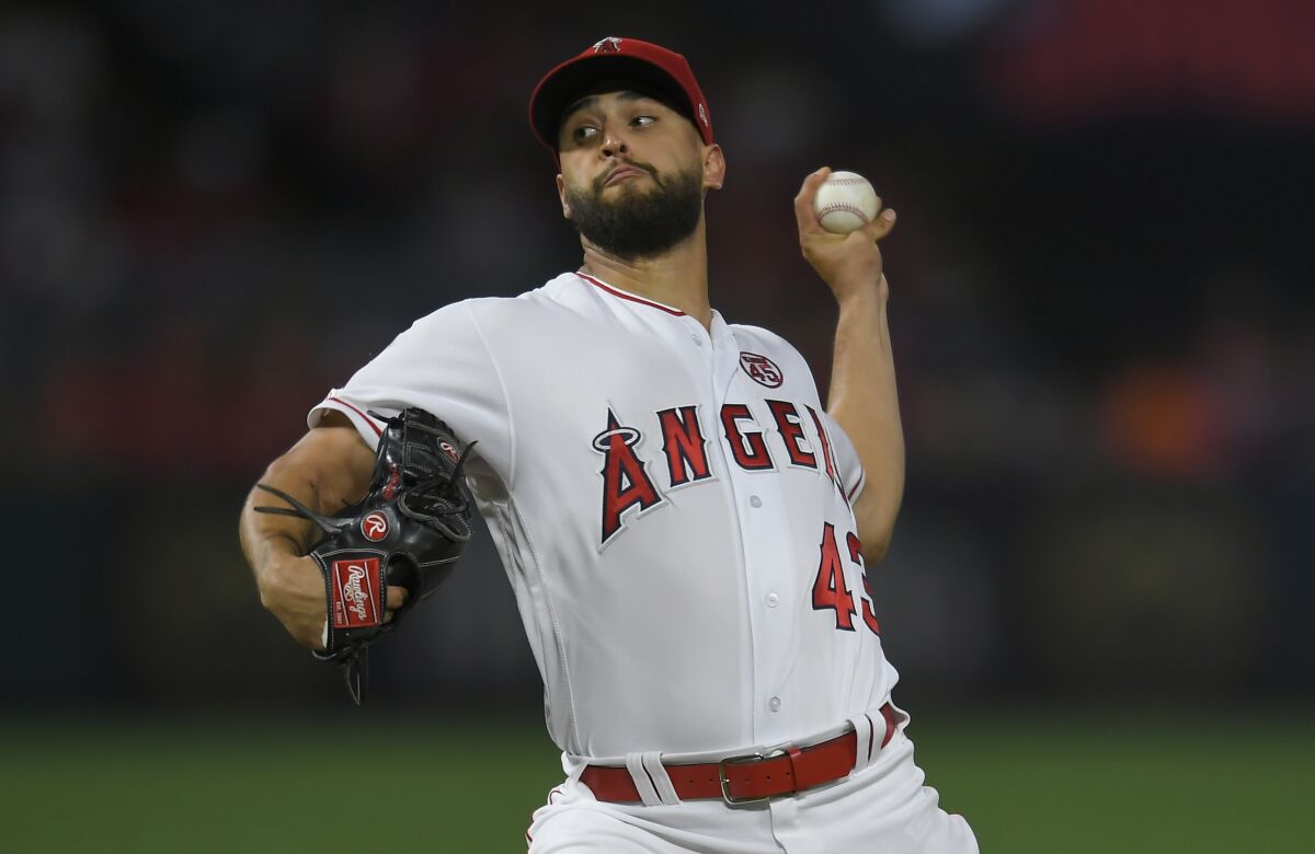 Angels pitcher Patrick Sandoval pitches against the Houston Astros in the first inning at Angel Stadium on Friday.