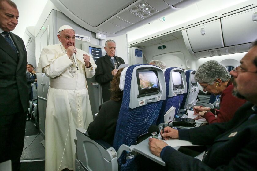 Pope Francis speaks to journalists aboard his flight from Mexico to Italy.