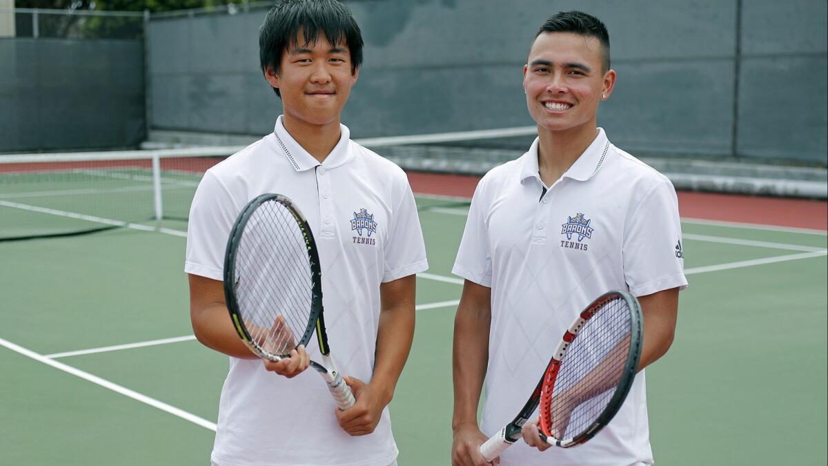 The No. 1 doubles team of Tommy Trinh, left, and Justin Pham went 25-0 in the Sunset League for Fountain Valley High. The duo helped the Barons win their first outright league title since 1991.