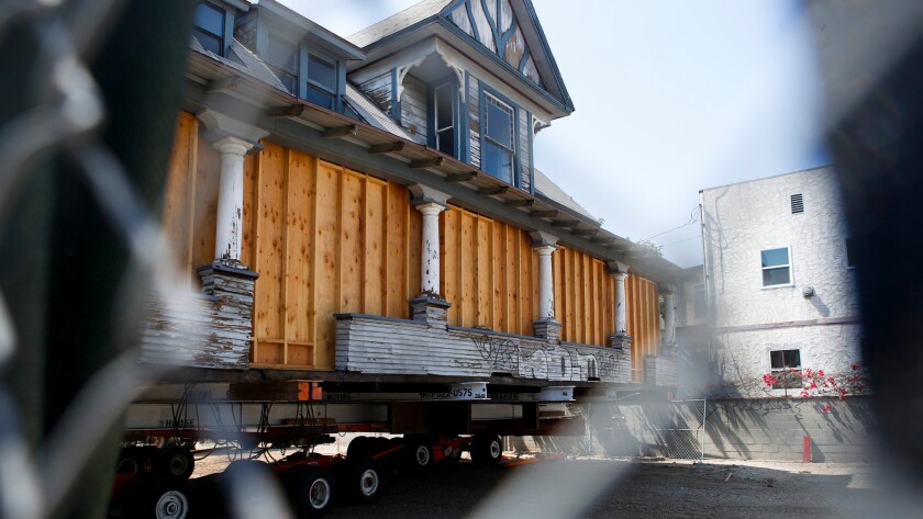 Built in Boyle Heights in 1895, the Peabody Werden House was moved across the street Thursday to make way for an affordable housing project.