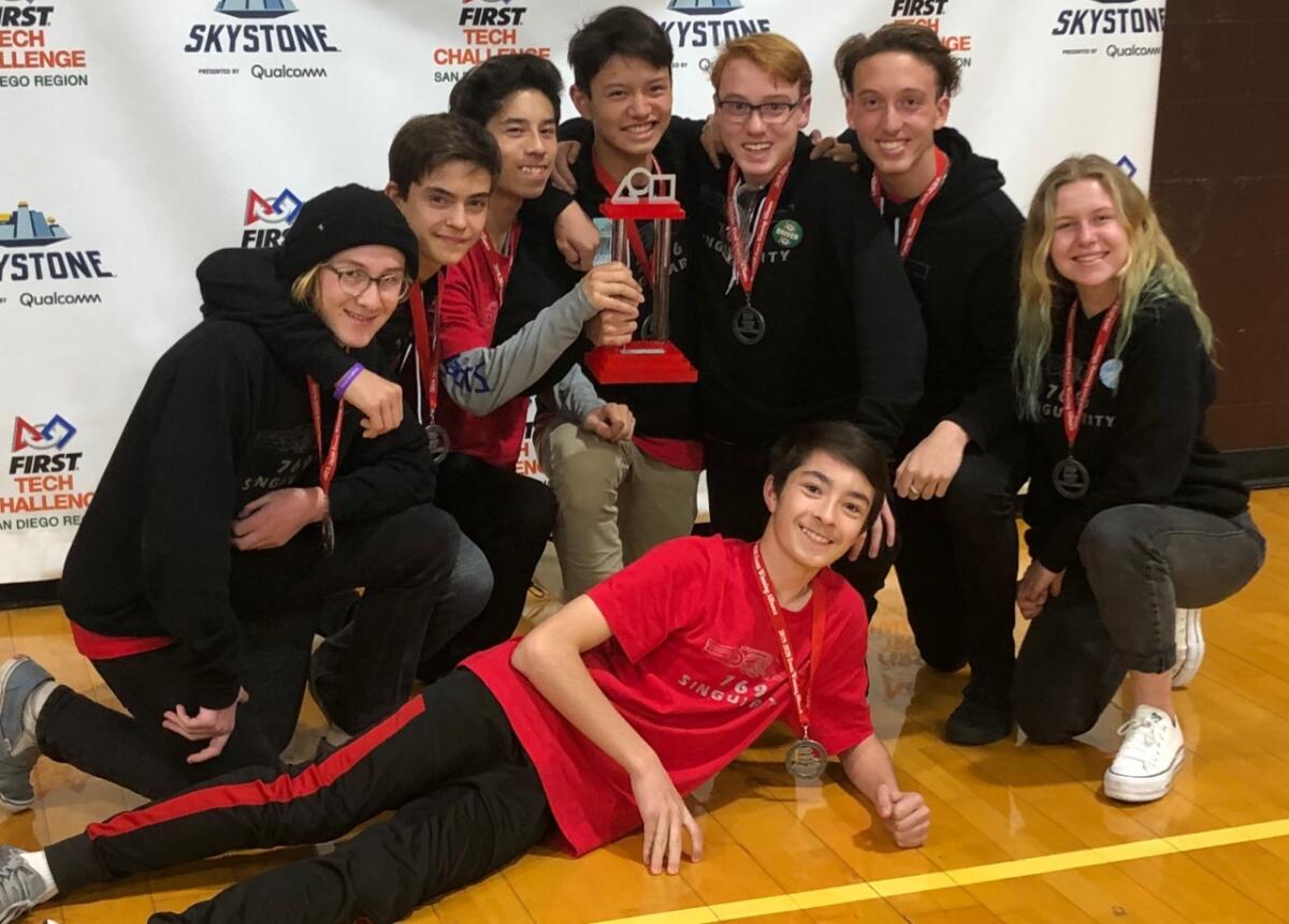 TextEditor Singularity robotics team members: (Top): Ryden Weber, Nick Sanford, Daniel Scuba, Brandon Shen, Brandon Powell, Dylan Powell; (Bottom): David Scuba, Carlee Weber