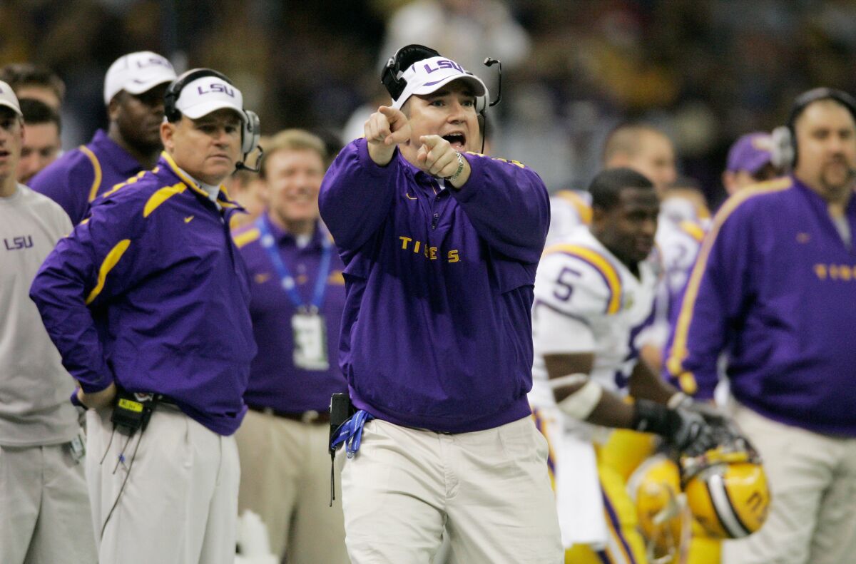LSU tight ends/recruiting coordinator Josh Henson yells directions during the BCS championship game.