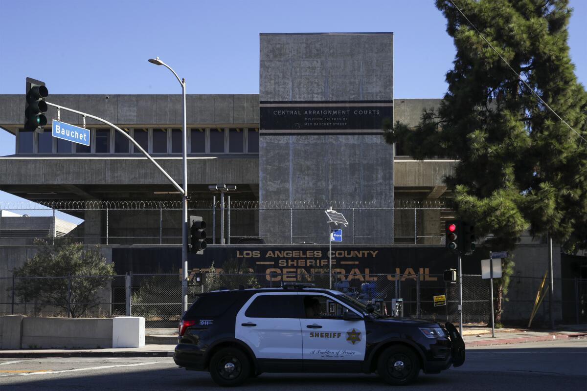 A sheriff SUV in front of Men's Central Jail.