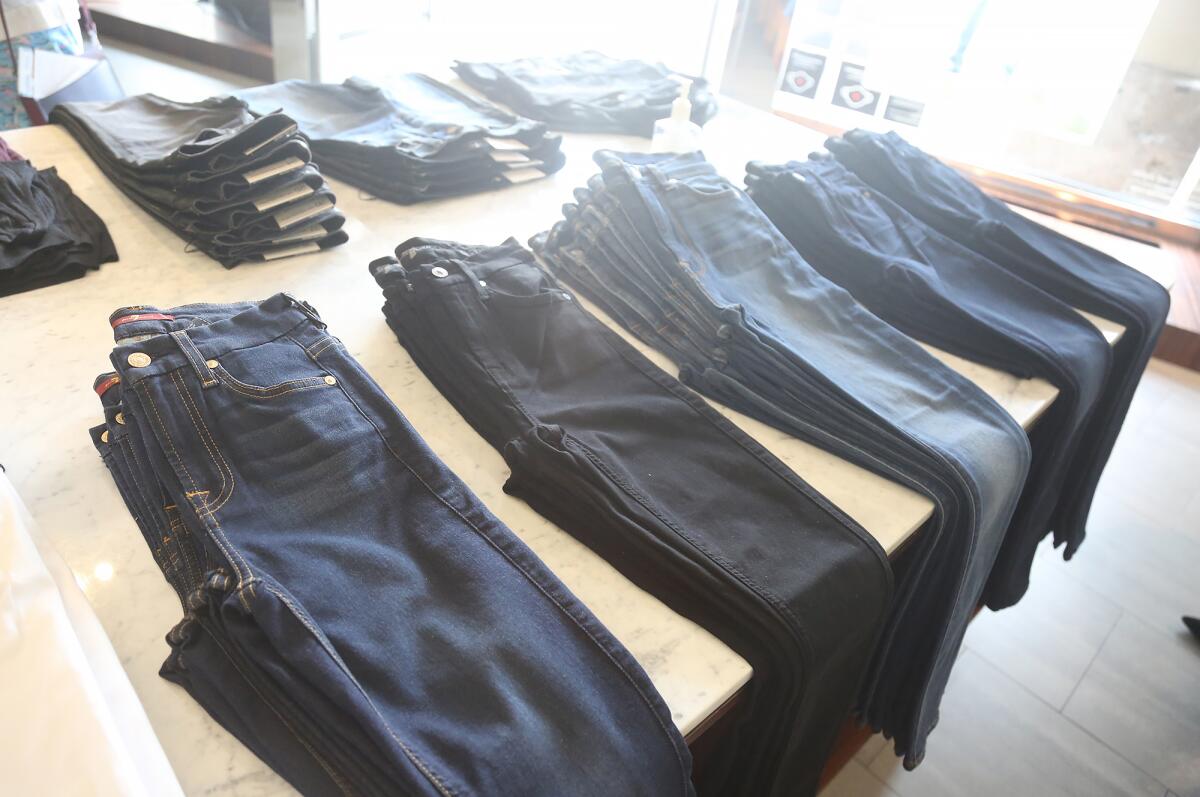 A lineup of the high-waisted, denim skinny jeans at the 7 for all Mankind store.