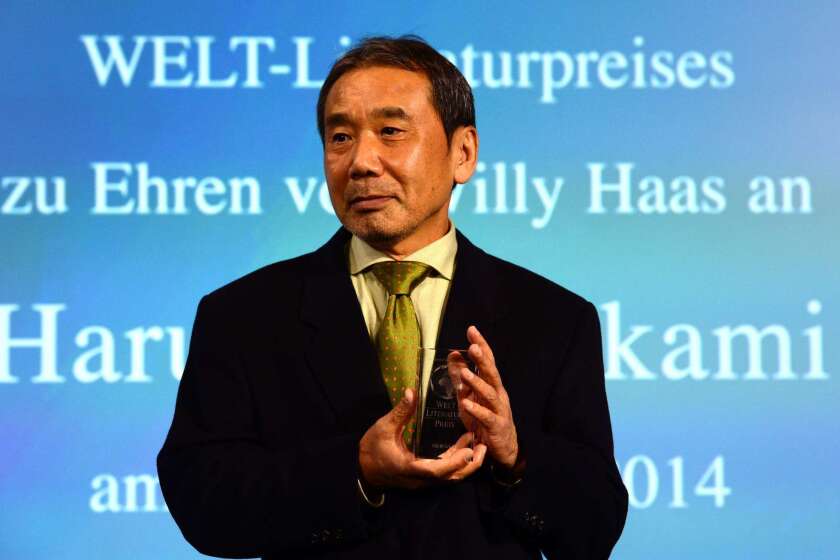 Japanese writer Haruki Murakami, shown accepting Germany's Welt Literature Prize in November, is going to write an online advice column.