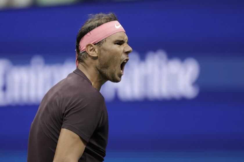 Rafael Nadal celebrates after winning a point against Richard Gasquet during the third round of the U.S. Open.