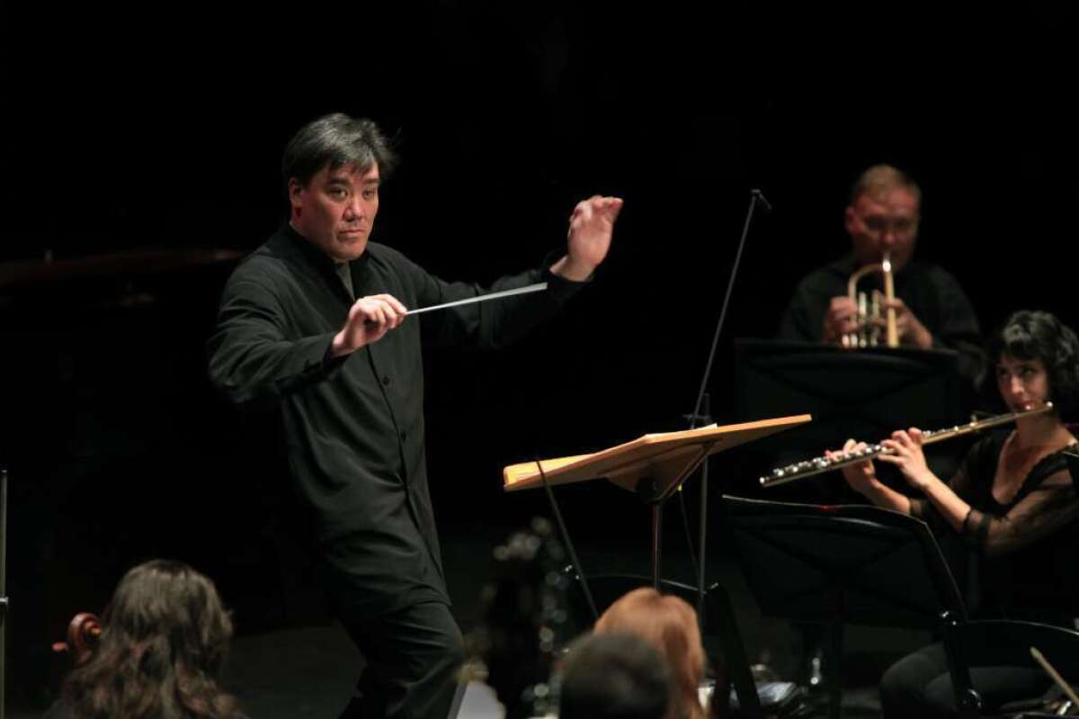Alan Gilbert conducting members of the New York Philharmonic in 2012.