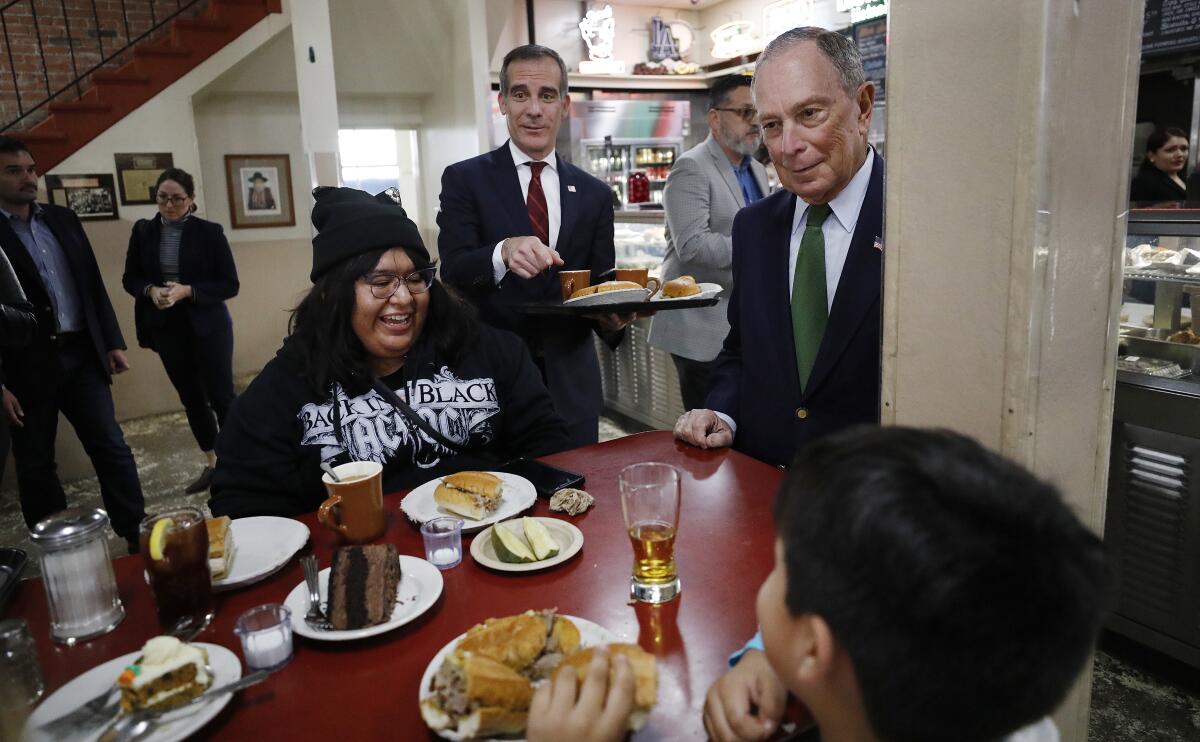 Michael Bloomberg visits Philippe the Original with L.A. Mayor Eric Garcetti.