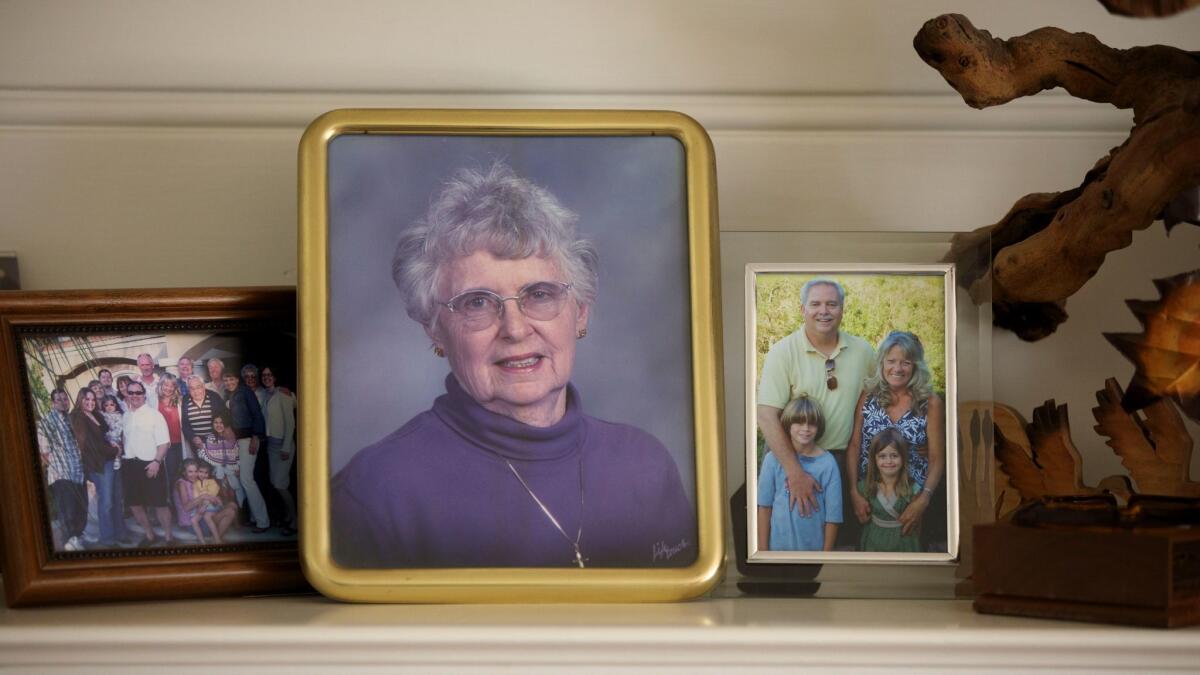 A photograph of Julie Shepherd on the mantel at Shepherd's home in West Covina.