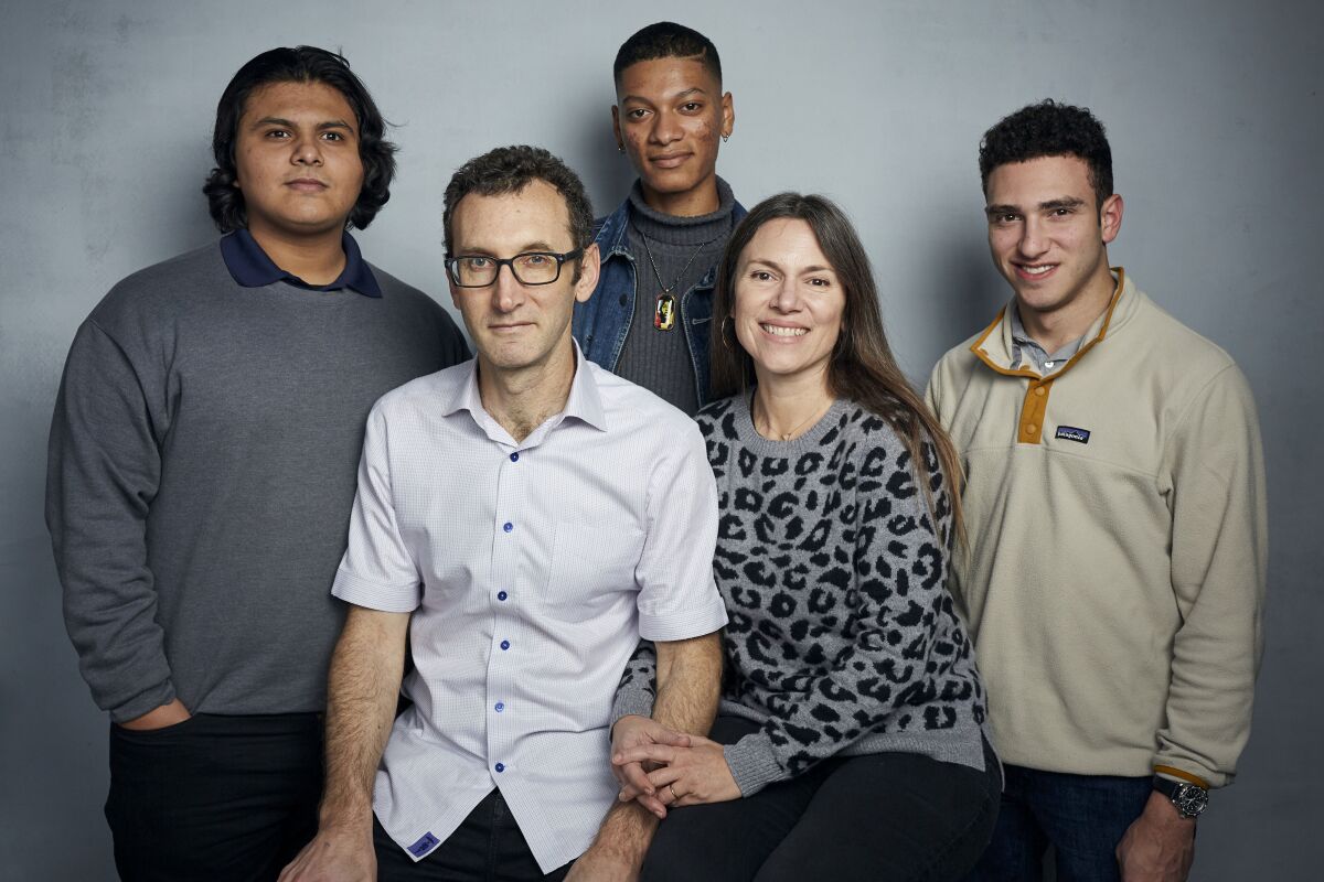 FILE - Steven Garza, from left, director Jesse Moss, Rene Otero, director Amanda McBaine and Ben Feinstein pose for a portrait to promote the film "Boys State" during the Sundance Film Festival in Park City, Utah on Jan. 24, 2020. In the documentary, directors Moss and McBaine attend a week-long program in Austin, Texas, where 1,100 high school boys attempt to build a mock government. (Photo by Taylor Jewell/Invision/AP, File)