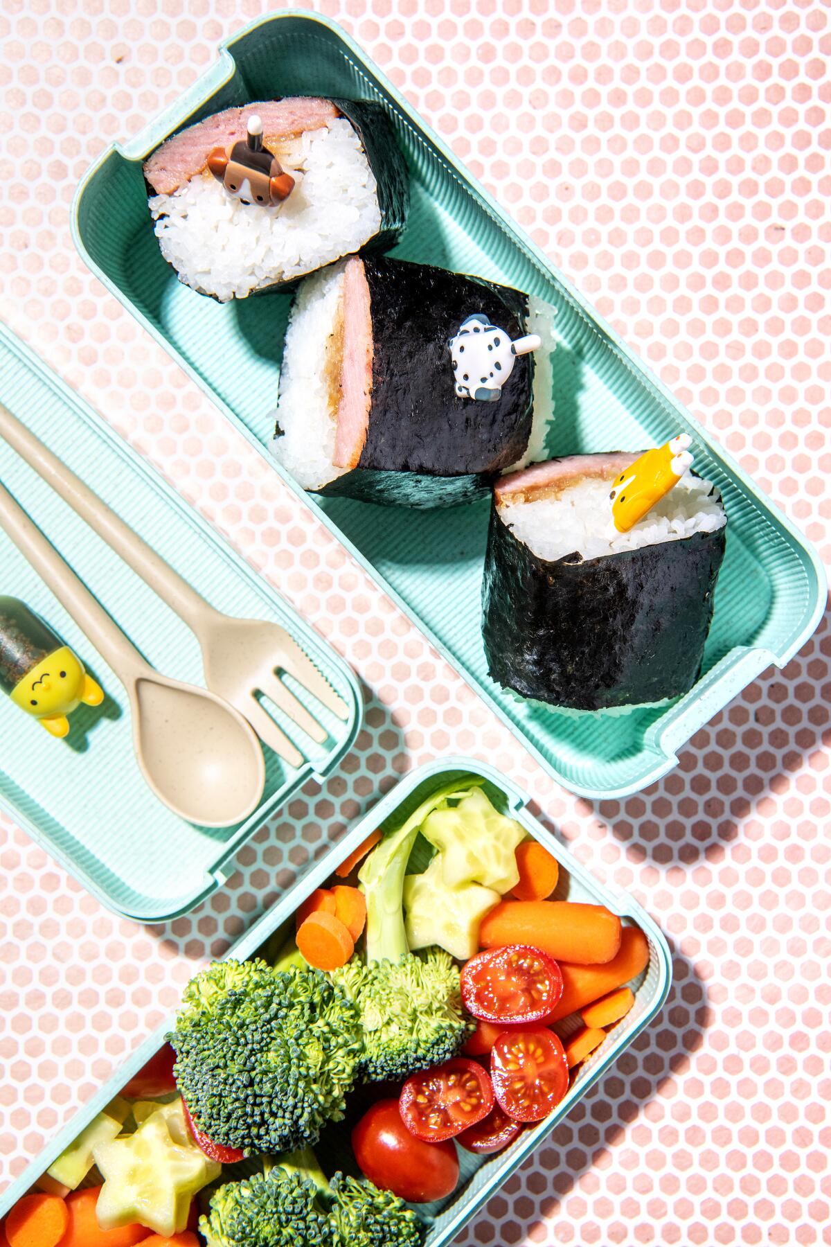 Spam musubi, cucumbers, tomatoes, baby carrots, and broccoli by Jessica Woo