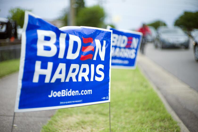 A campaign sign is seen before first lady Jill Biden visits the Virginia Beach Democratic Coordinated Campaign Office on Thursday, June 27, 2024, in Virginia Beach, Va. (AP Photo/John C. Clark)