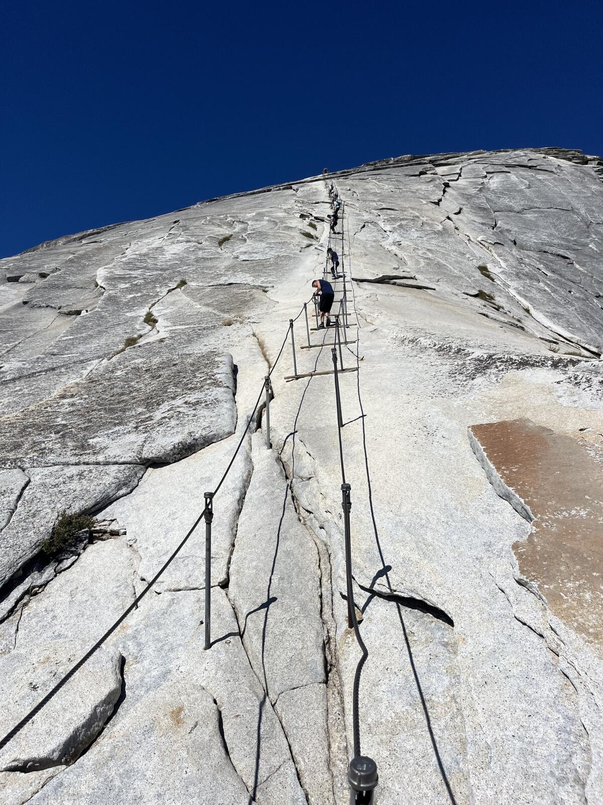 The Half Dome cables span the last 400 feet of an eight-mile hike from Yosemite Valley to the top of Half Dome.