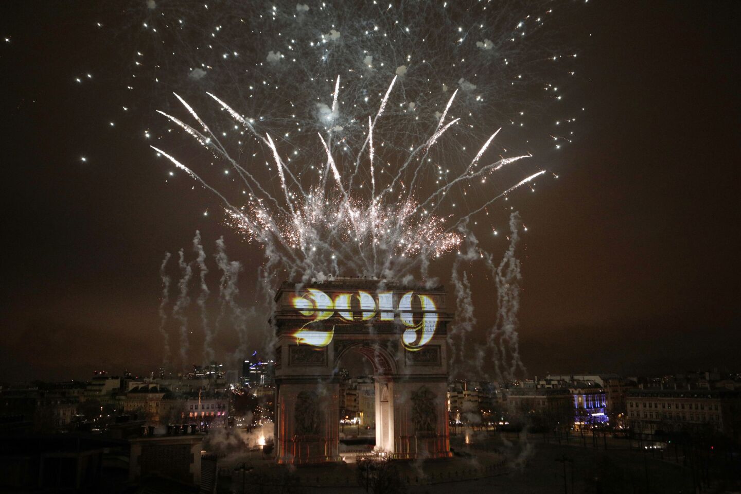 The new year lights up Paris' Arc de Triomphe.