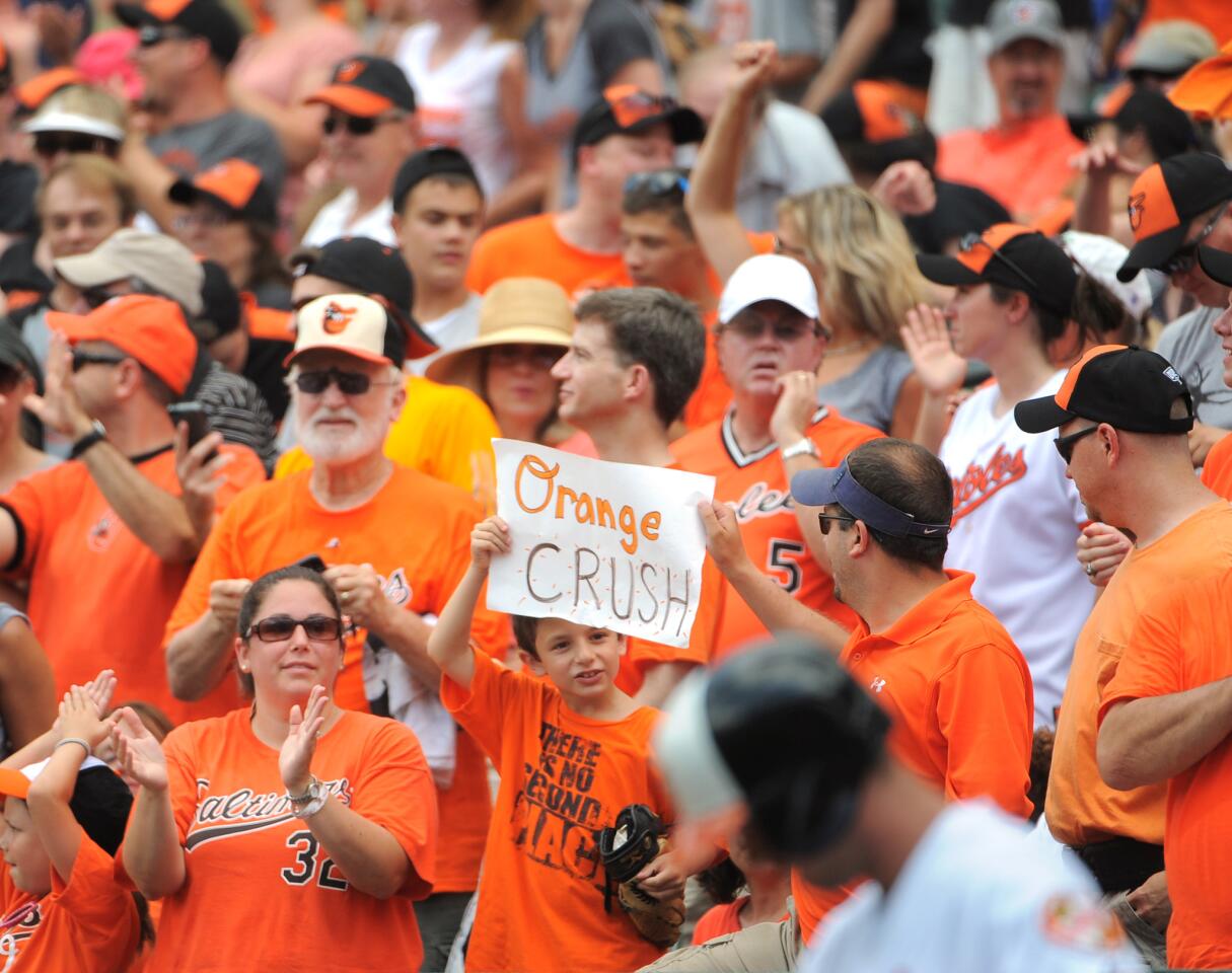 An Orioles fan holds up a sign for Chris Davis during the O's 7-4 win over the Toronto Blue Jays.