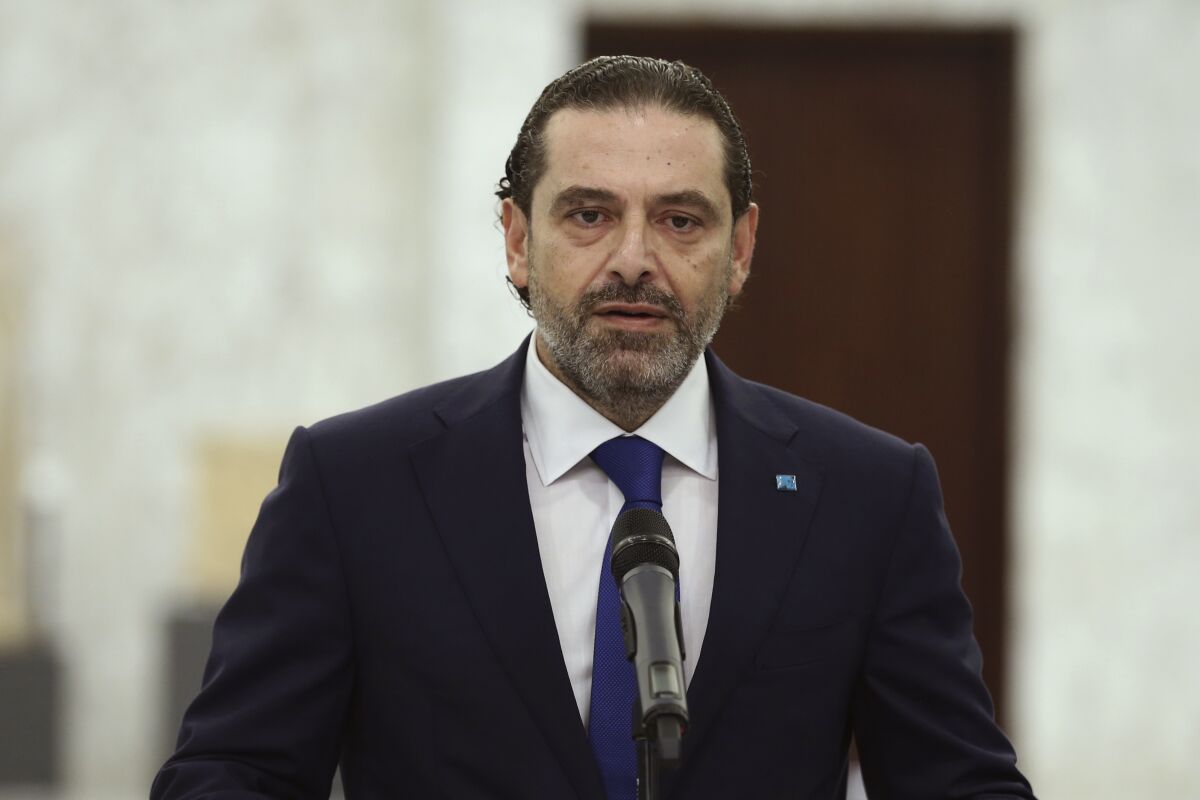 In this photo released by Lebanon's official government photographer Dalati Nohra, Lebanon's Prime Minister-designate Saad Hariri, speaks after his meeting with Lebanese president Michel Aoun, at the presidential palace, in Baabda, east of Beirut, Lebanon, Thursday, July 15, 2021. Hariri said Thursday he was stepping down, nine months after he was named to the post by the parliament and citing "key differences" with the country's president. (Dalati Nohra via AP)