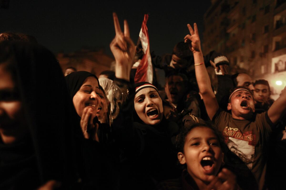 Crowds in Cairo's Tahrir Square react in 2011 to the announcement that then-President Hosni Mubarak would step down. Slain activist Bassem Mohsen was one of the first to leave his city and join the protest movement that ended Mubarak's rule.