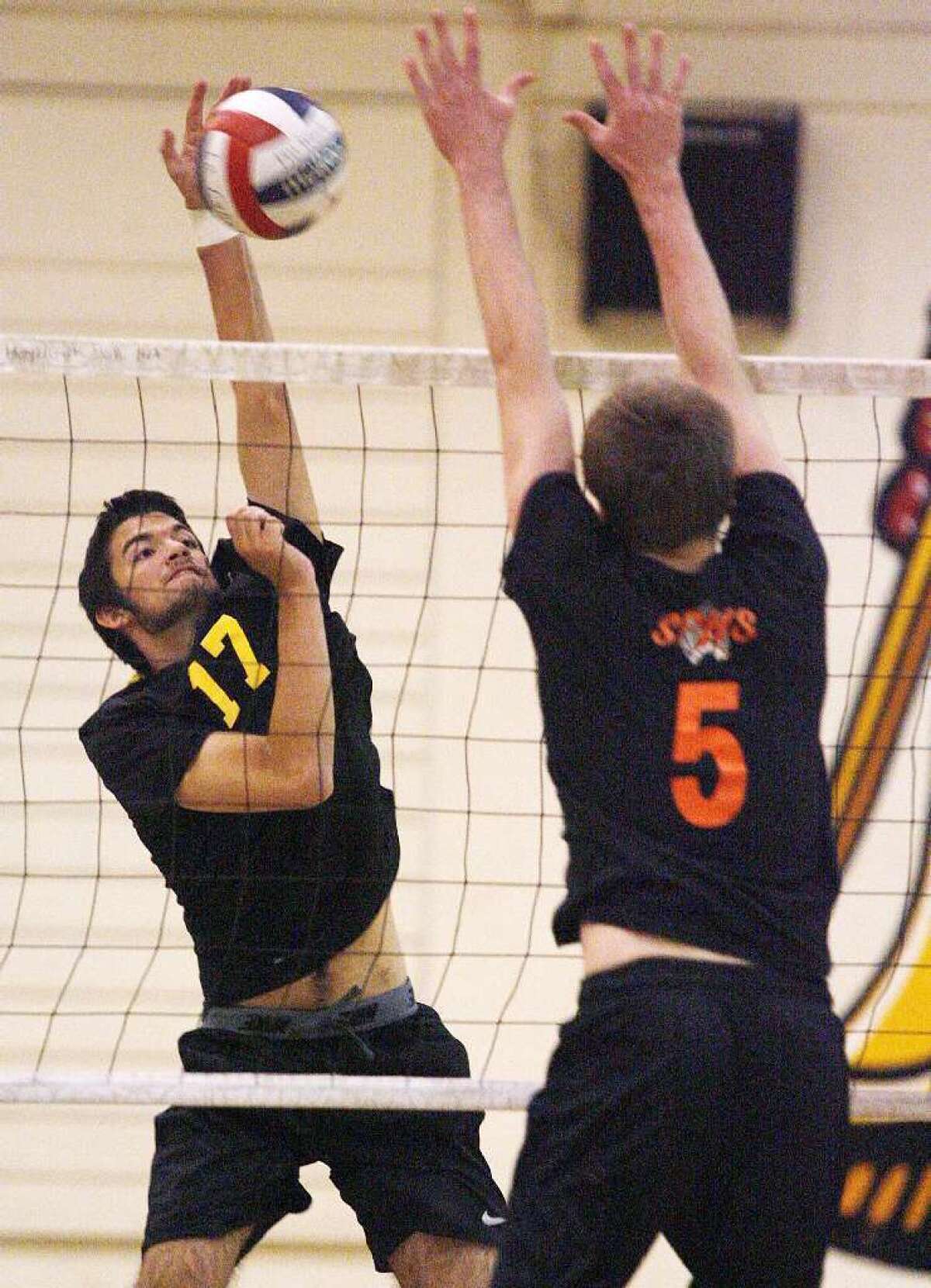 ARCHIVE PHOTO: La Cañada High's Orion Burl, left, is an All-Area Boys' Volleyball second-team selection.