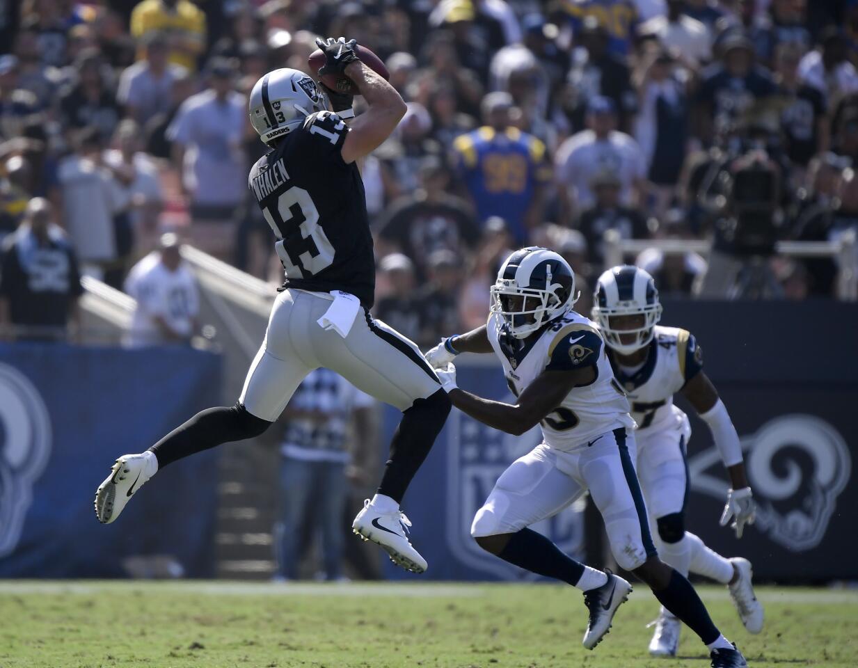 APphoto_Raiders Rams Footbal