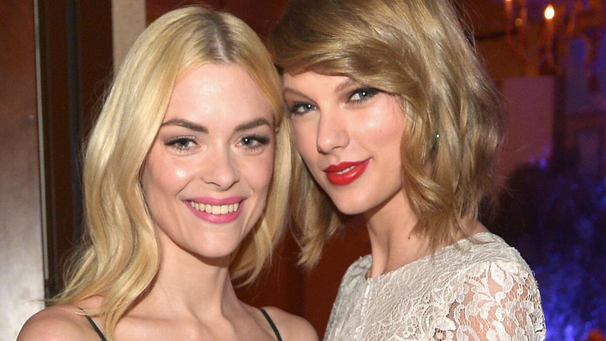 Jaime King, left, and Taylor Swift at the Weinstein Co.'s Oscar party in 2014. They'd first hit it off earlier that year at Weinstein's Golden Globes gathering.
