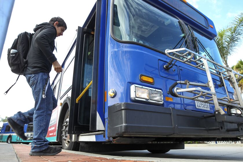 A man gets on a NCTD Breeze bus at the Oceanside Transit Center on Saturday, June 29, 2019 in Oceanside, California.